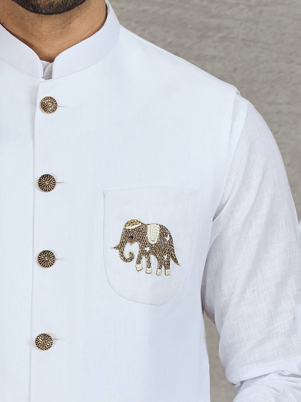 White linen waistcoat with shirt and intricate zardosi work