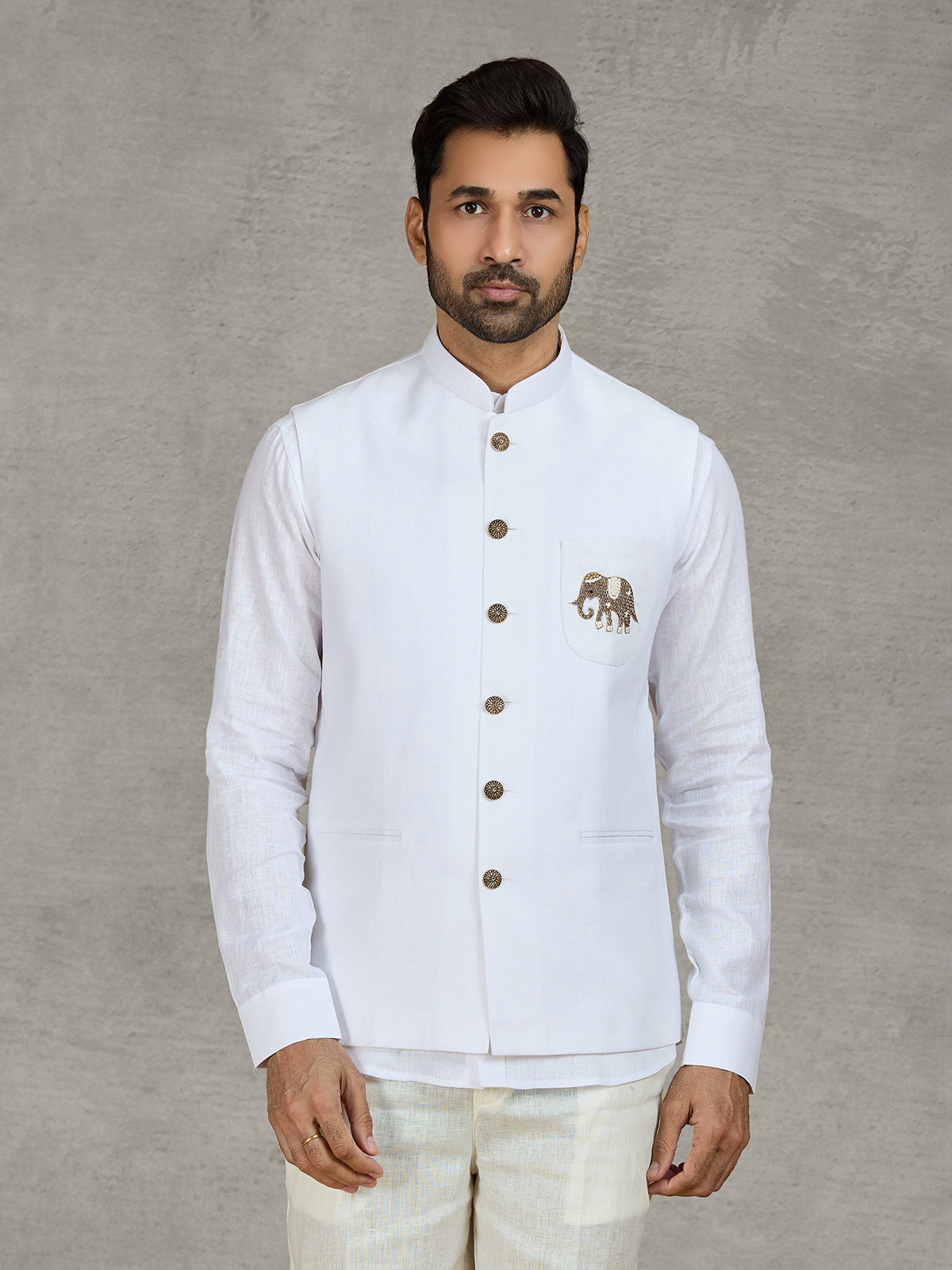 White linen waistcoat with shirt and intricate zardosi work