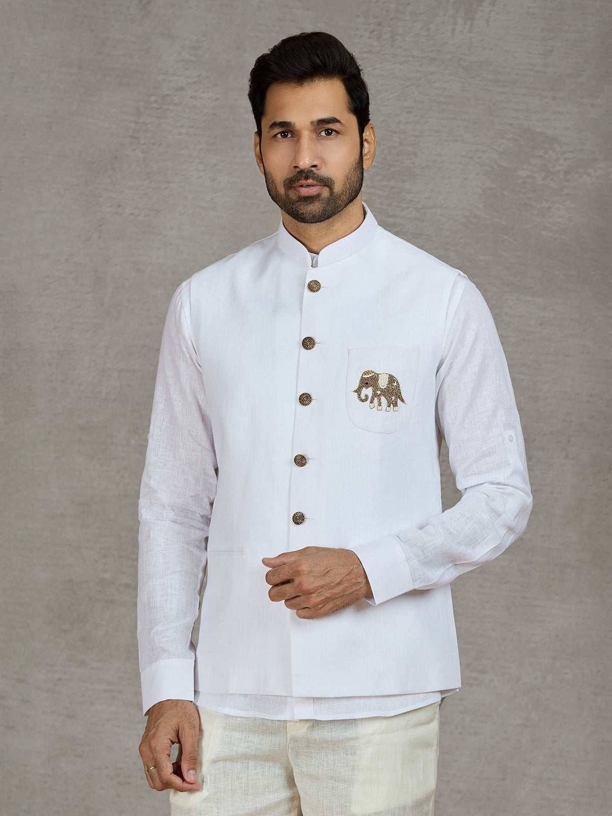 White linen waistcoat with shirt and intricate zardosi work