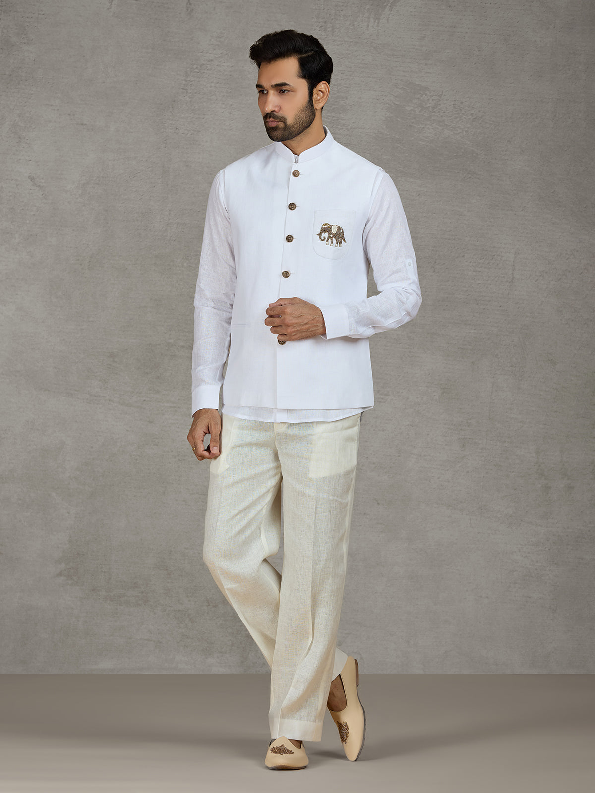 White linen waistcoat with shirt and intricate zardosi work
