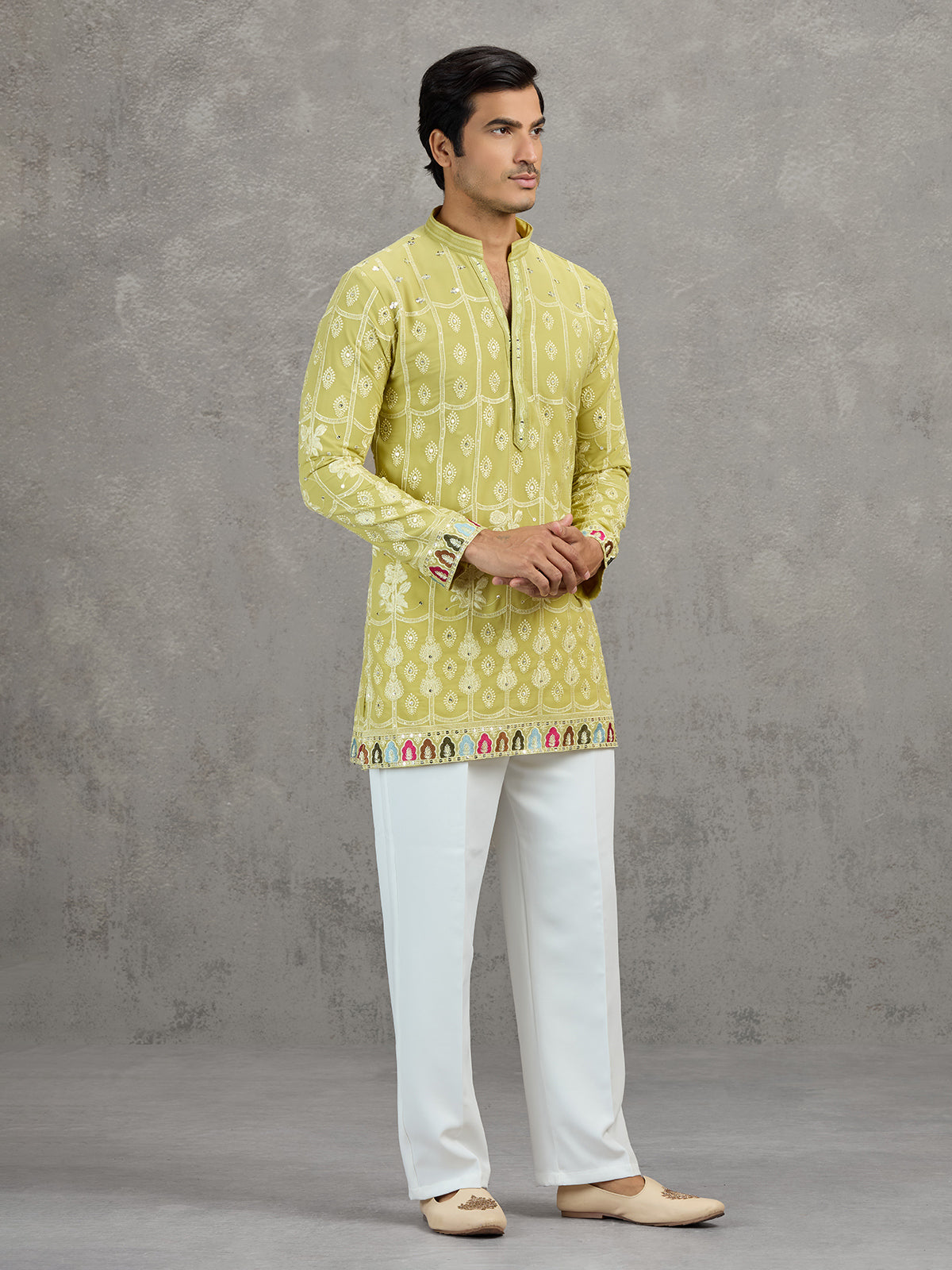 Pista green short silk embroidered festive kurta suit