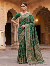 Green art patola silk saree with intricate handcrafted detailing