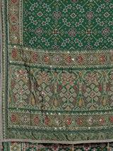 Green art patola silk saree with intricate handcrafted detailing