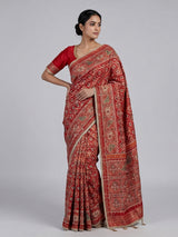 Crimson maroon art patola silk saree with embellished detailing