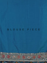 Bright blue art patola silk saree with shimmering embellishments