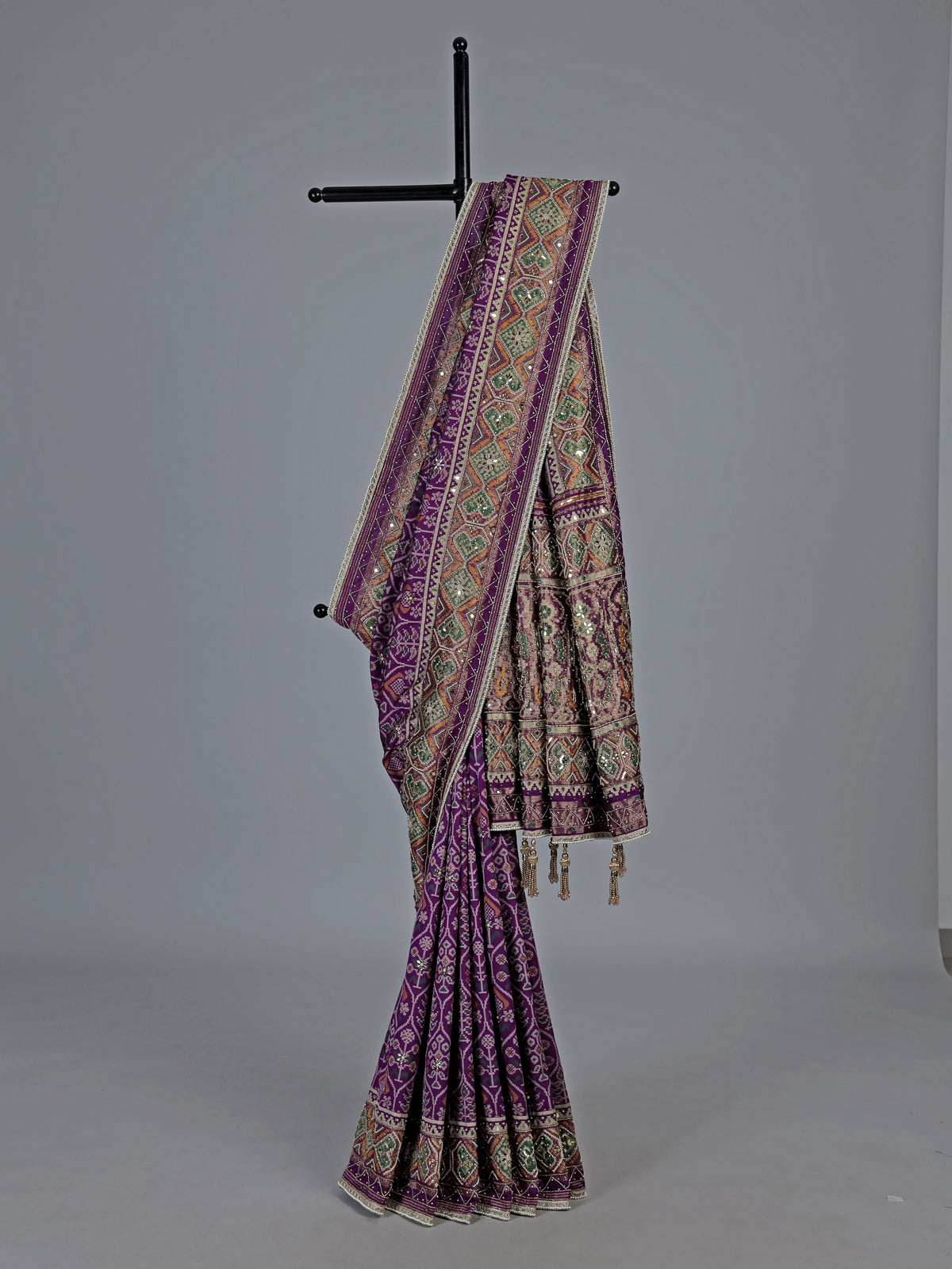Regal purple art patola silk saree with embellished geometric weave
