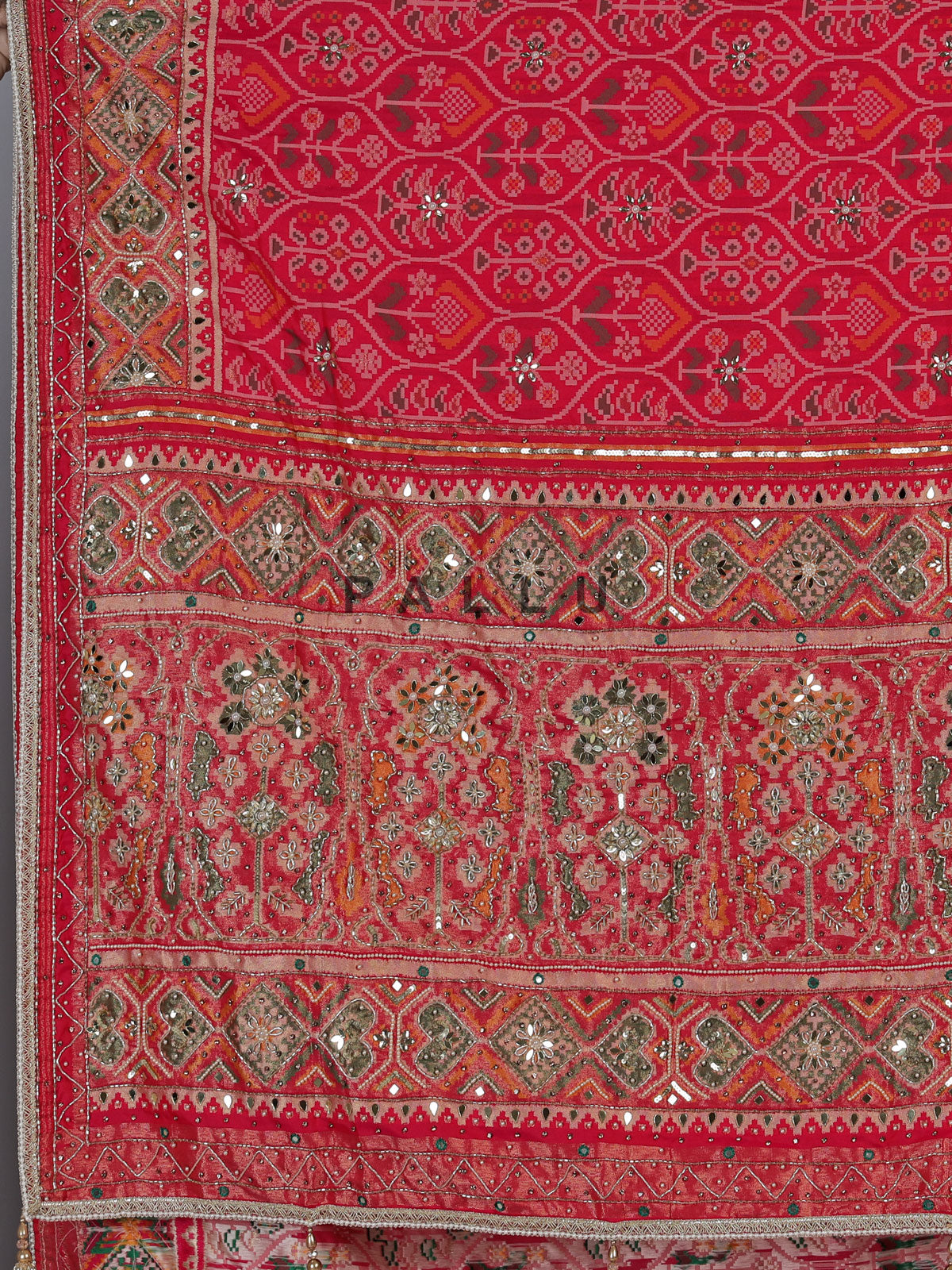 Rani pink art patola silk saree with radiant embellishments