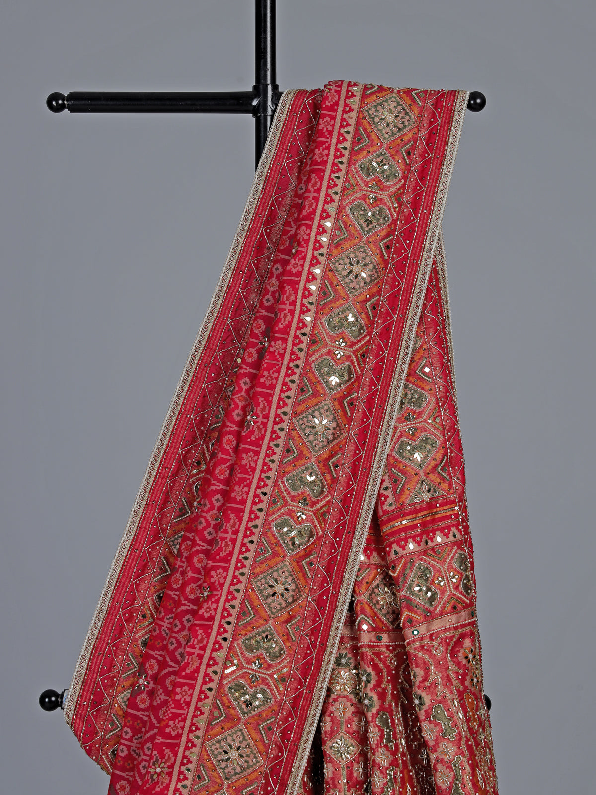 Rani pink art patola silk saree with radiant embellishments
