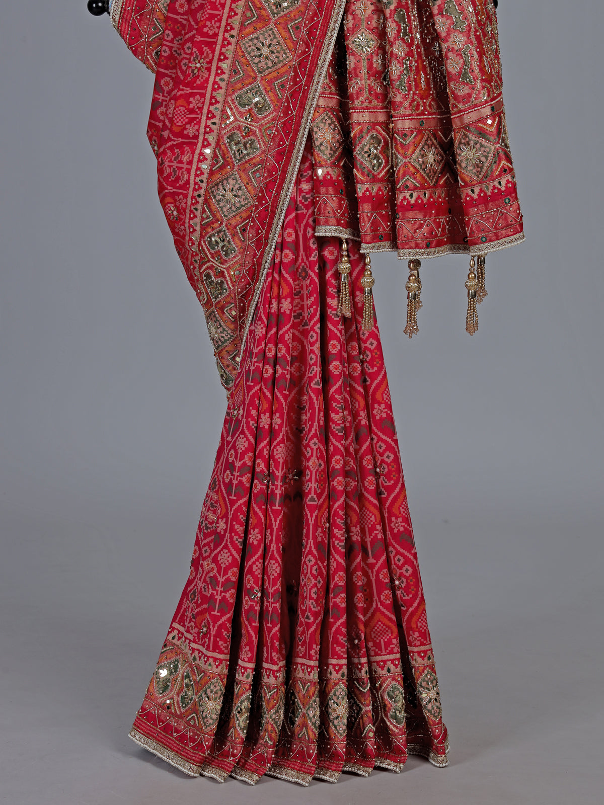 Rani pink art patola silk saree with radiant embellishments