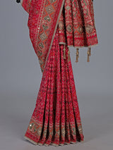 Rani pink art patola silk saree with radiant embellishments