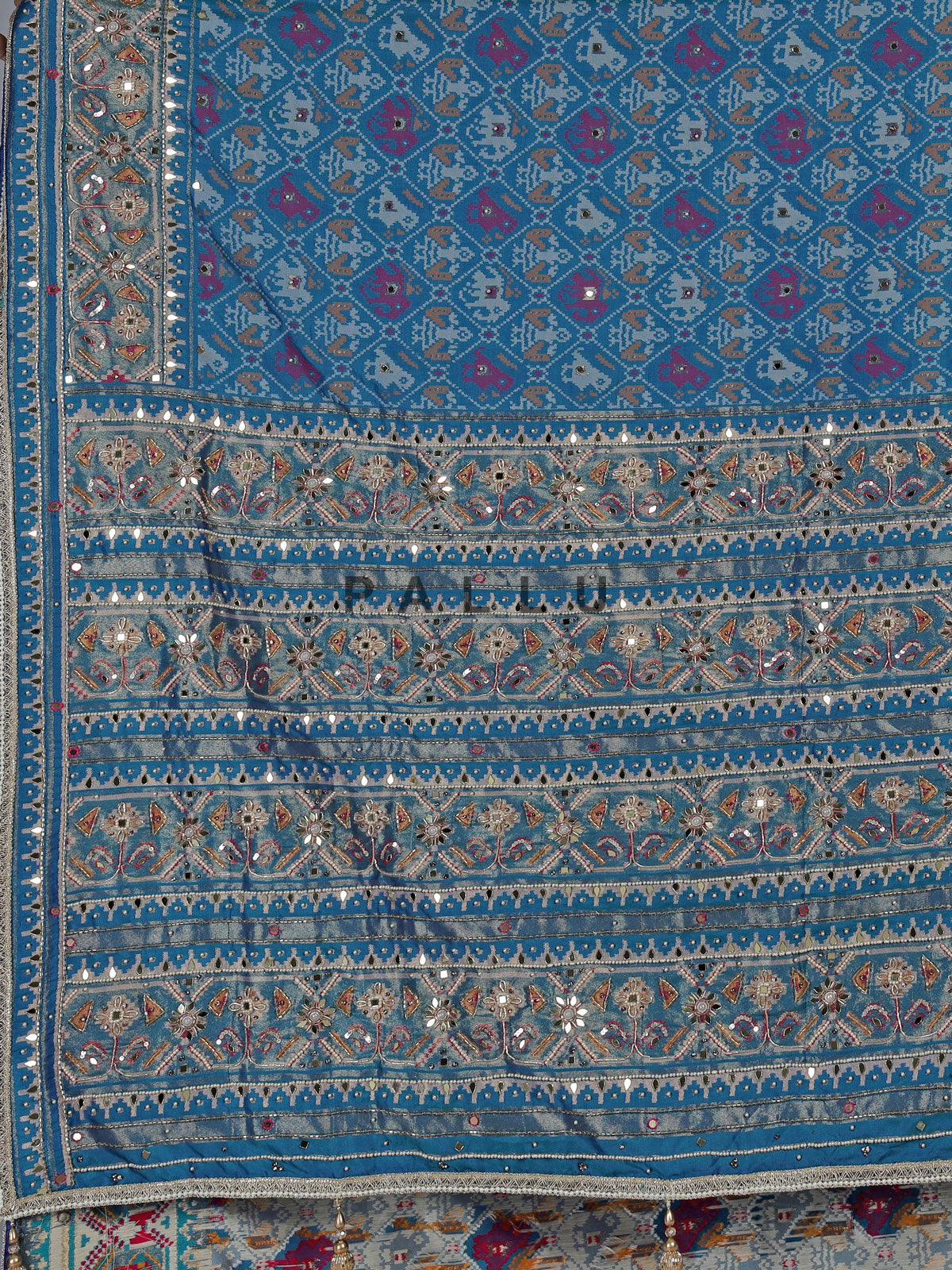 Blue art patola silk saree with ajrakh inspired motifs