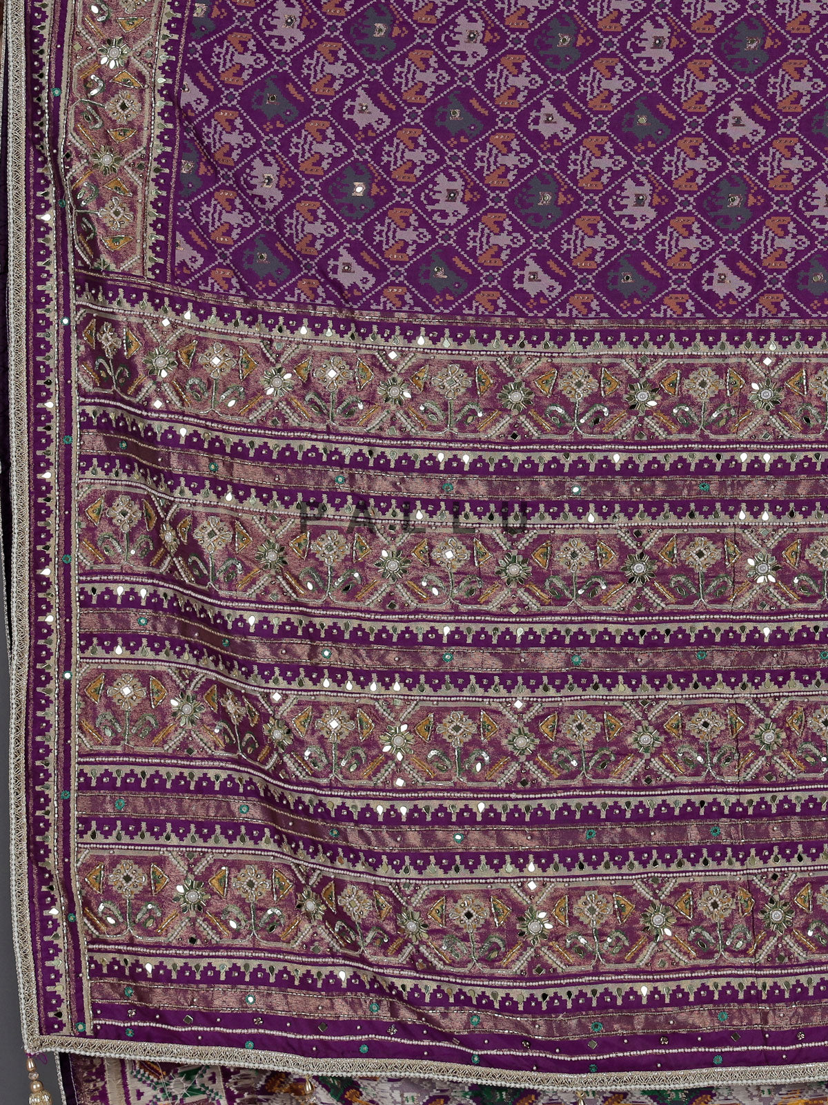 Purple art patola silk saree with ajrakh inspired detailing