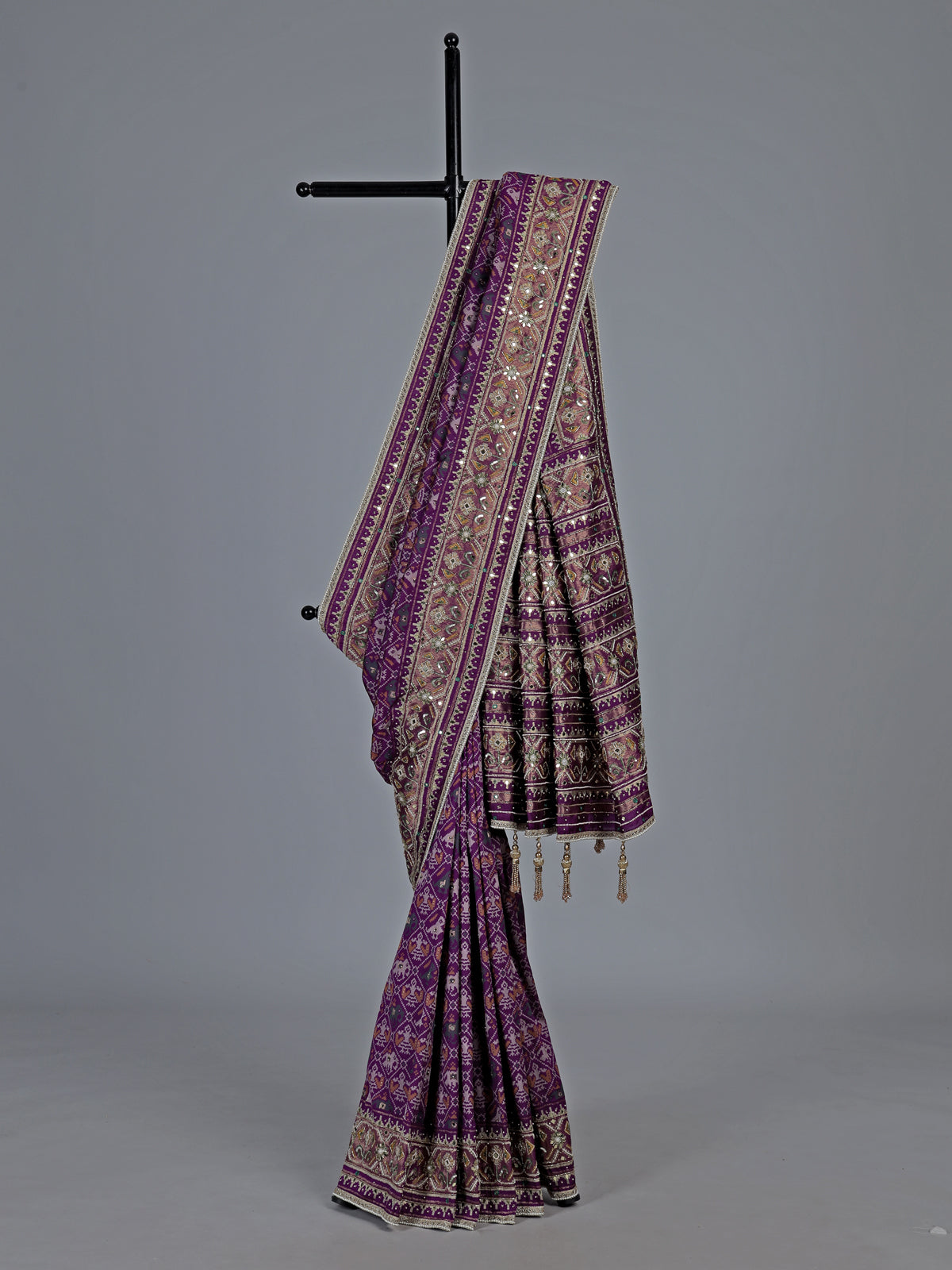 Purple art patola silk saree with ajrakh inspired detailing