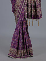 Purple art patola silk saree with ajrakh inspired detailing