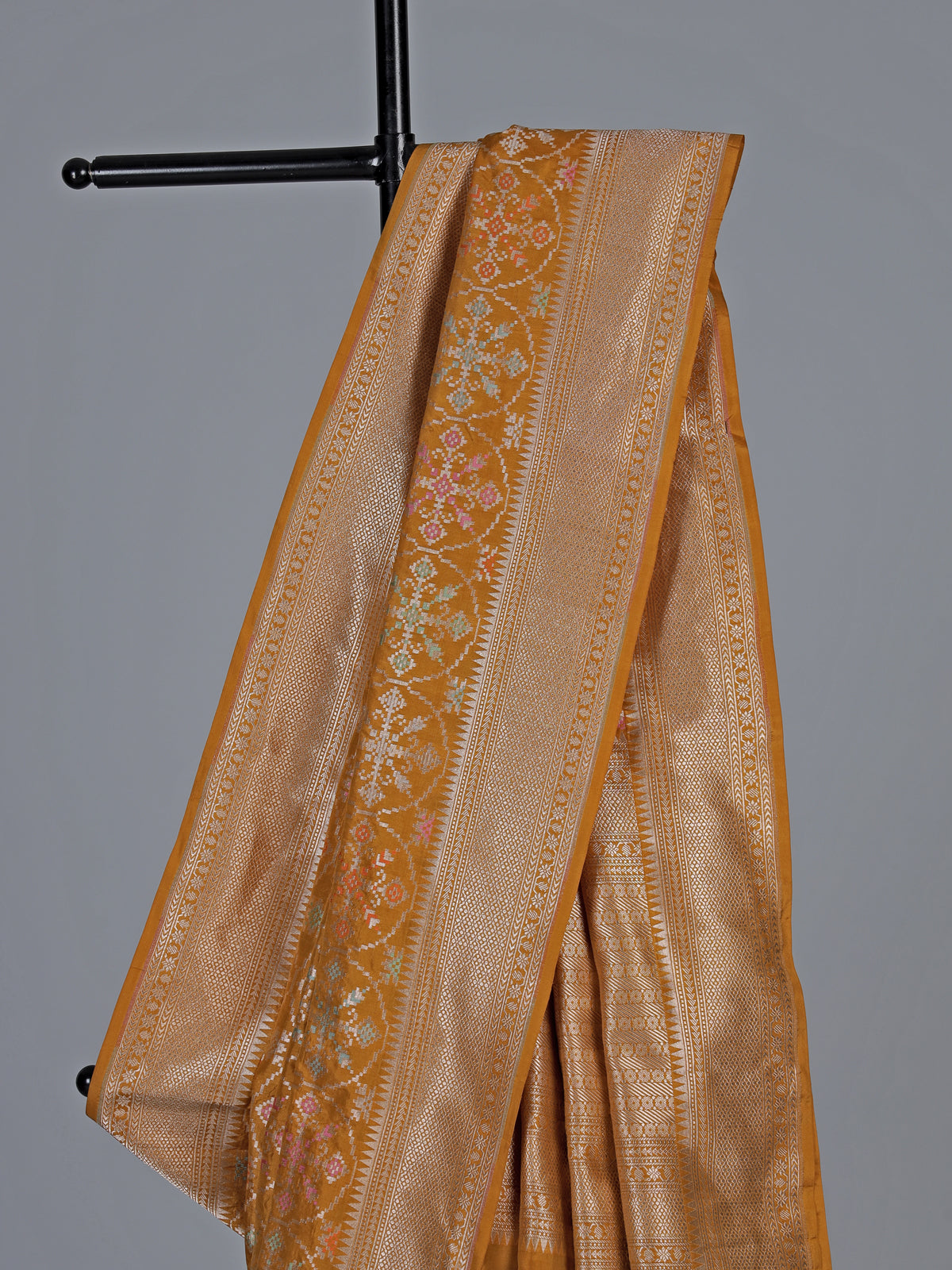 Mustard yellow banarasi silk saree with meenakari zari elegance