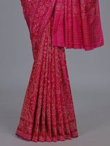 Rani pink banarasi silk saree with floral zari artistry