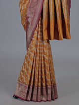 Mustard yellow banarasi silk saree with magenta zari border
