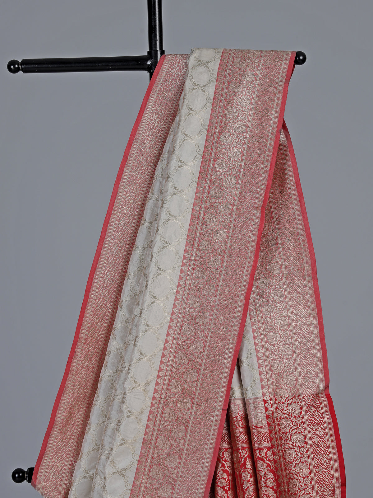 Off white banarasi silk saree with delicate zari detailing