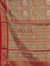 Light brown hyderabadi patola silk saree with heritage motifs