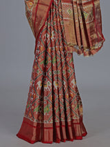 Light brown hyderabadi patola silk saree with heritage motifs