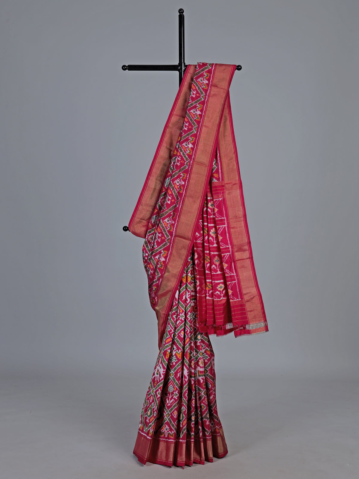 Fuchsia magenta hyderabadi patola silk saree with geometric weave