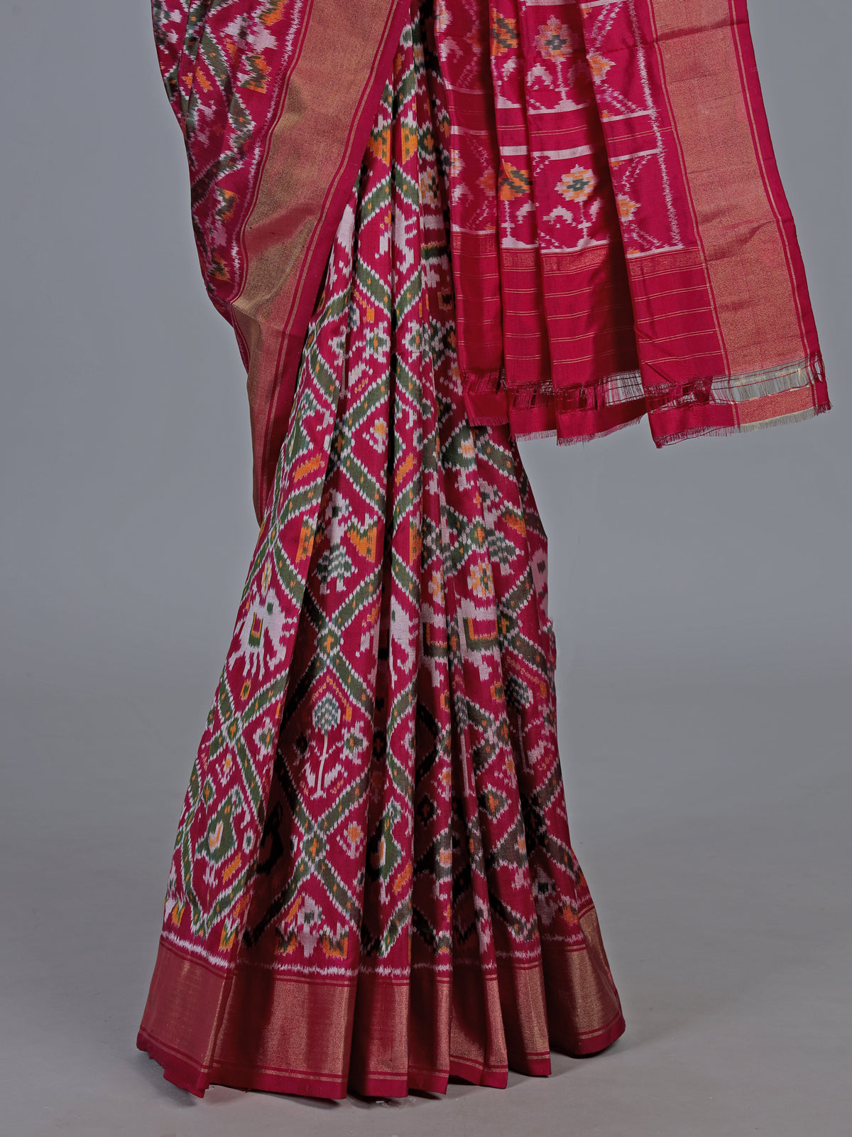 Fuchsia magenta hyderabadi patola silk saree with geometric weave