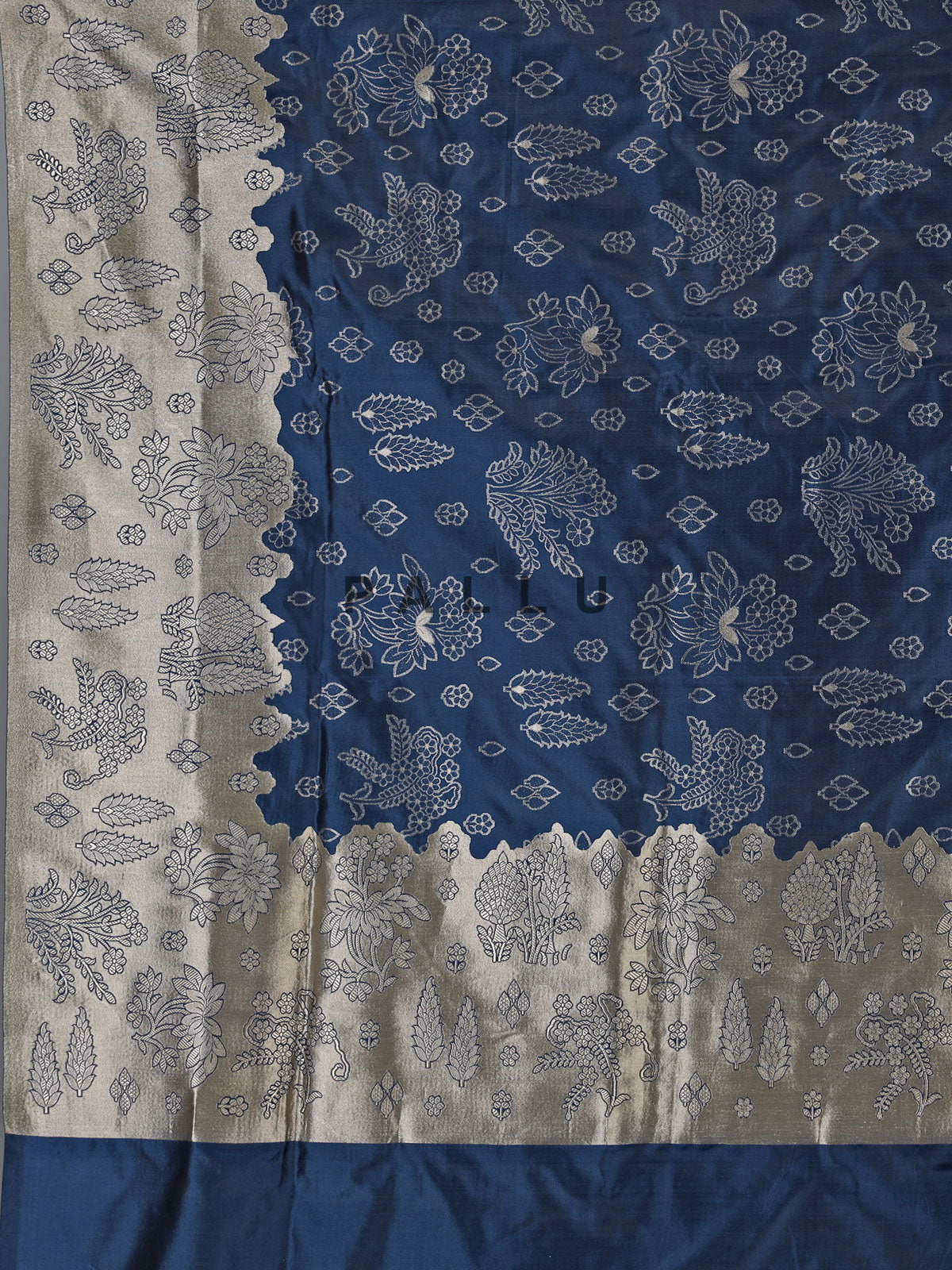 Dual tone blue banarasi silk saree with gold zari detailing