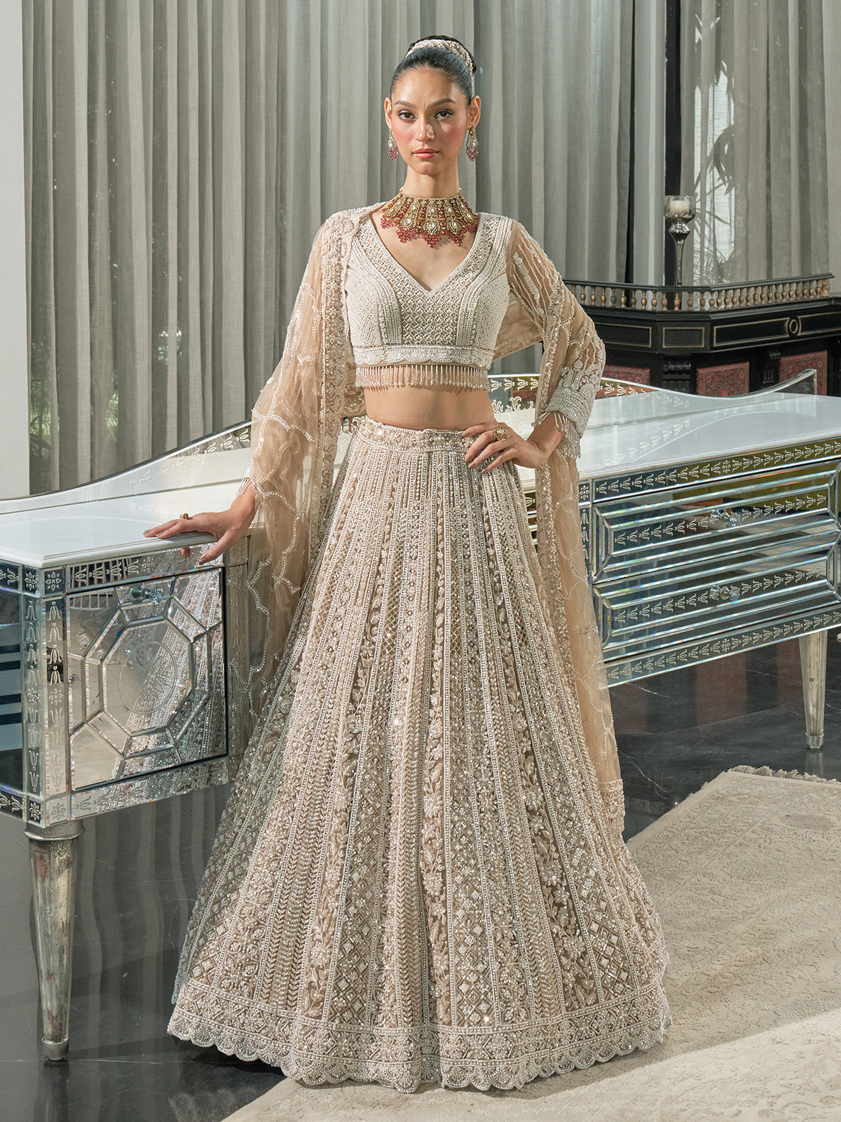 Champagne gold net designer lehenga choli with cutdana detail
