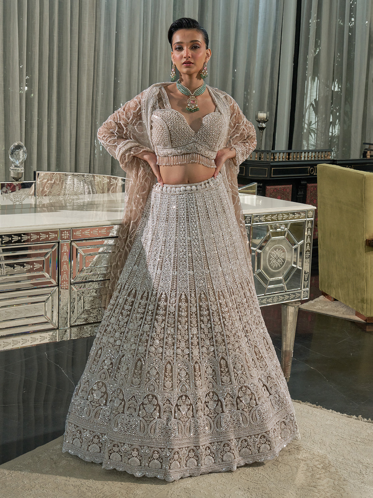 Beige net embellished lehenga choli with cutdana and sequins