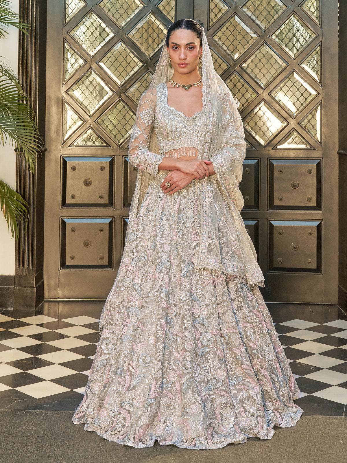 Mint blue net lehenga choli with floral resham and sequin work