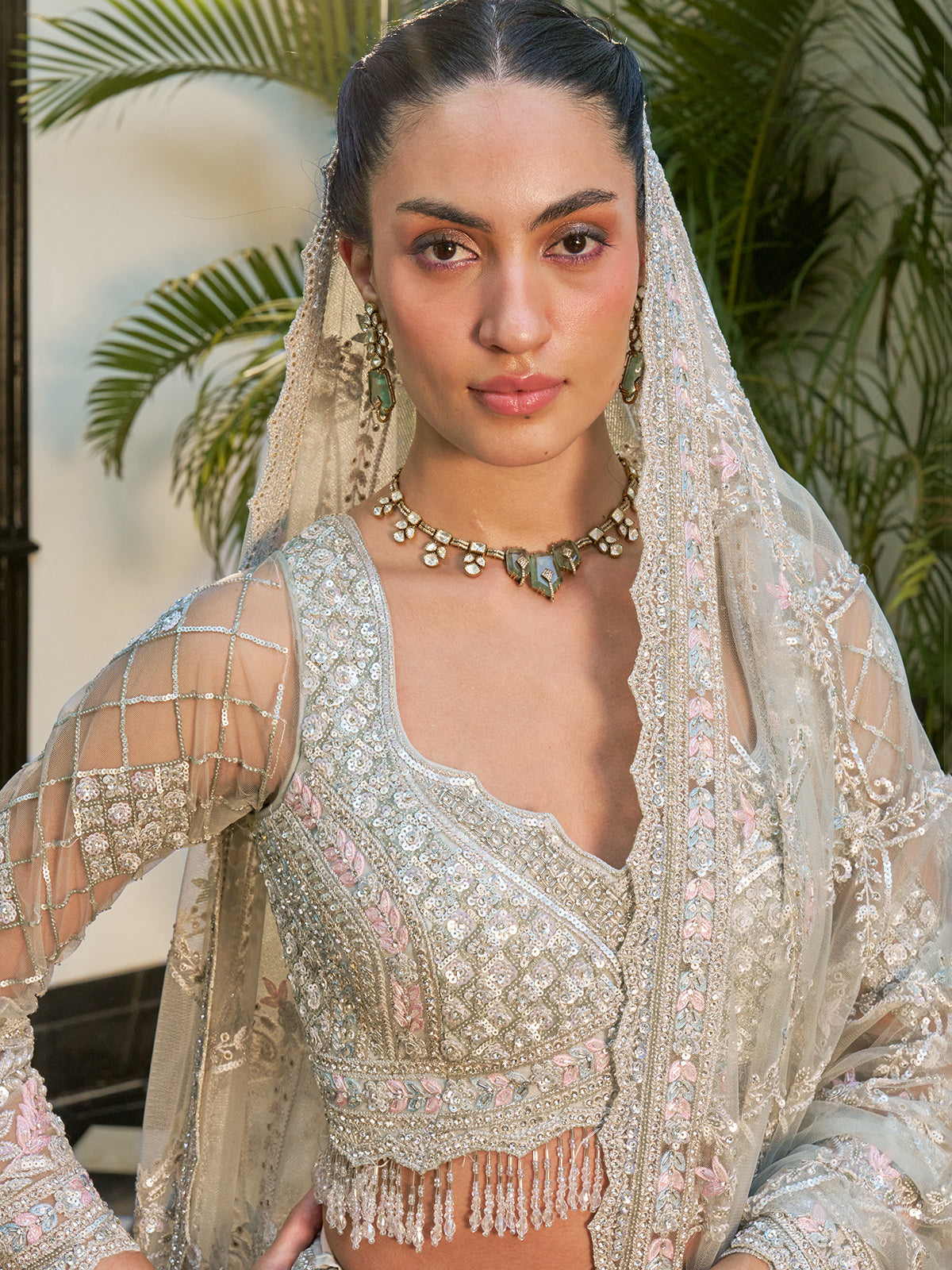 Mint blue net lehenga choli with floral resham and sequin work