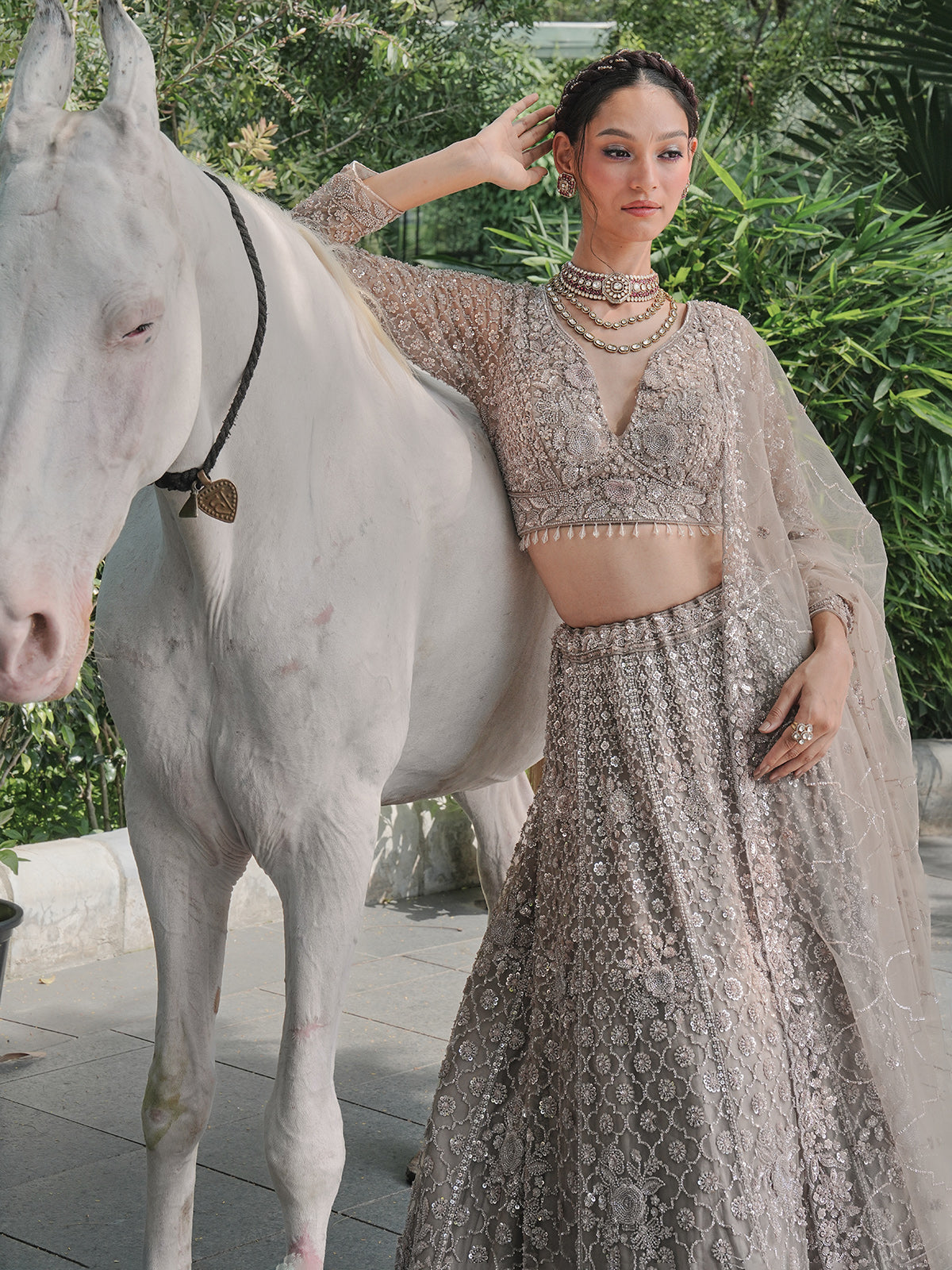 Grey net lehenga choli with sequin, cutdana and floral motifs
