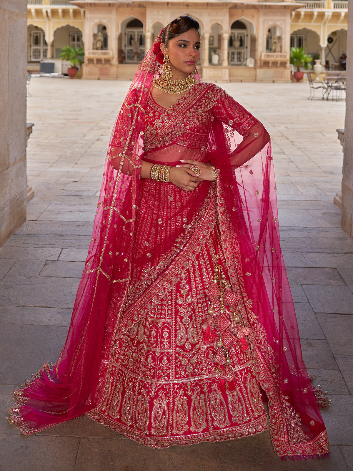 Pink silk net bridal lehenga choli with resham, cutdana and sequin work