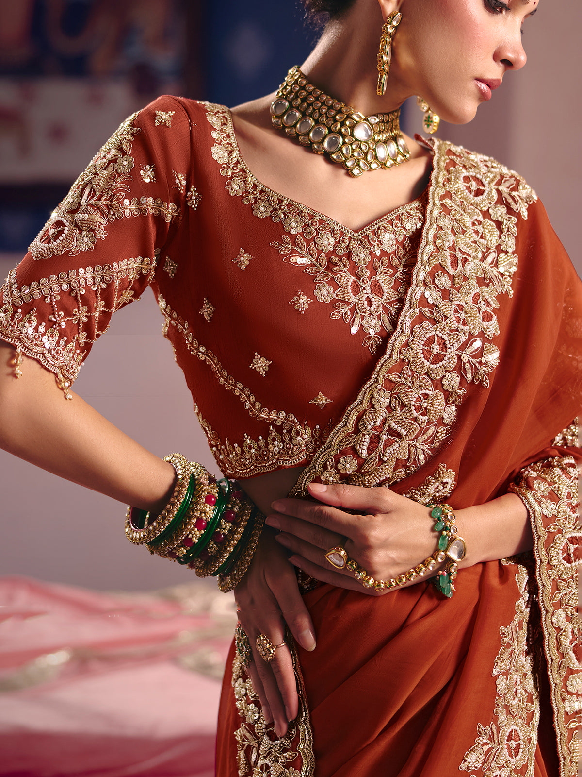 Dusty orange viscose zari tissue saree with embellished border