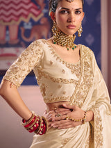 Cream viscose zari tissue saree with embellished border