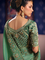 Pastel green viscose zari tissue saree with embellished border