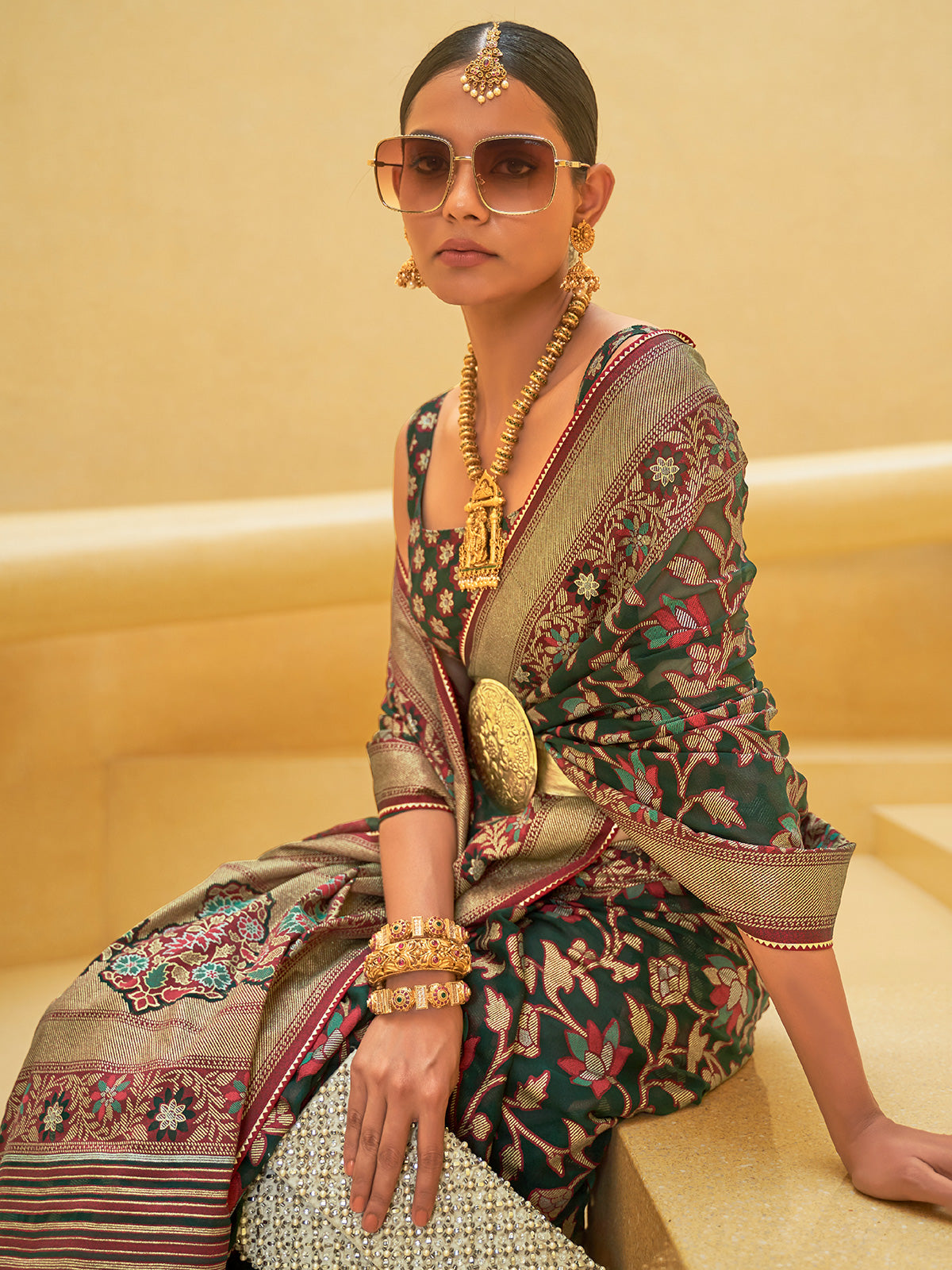 Dark green soft organza saree with zari shine