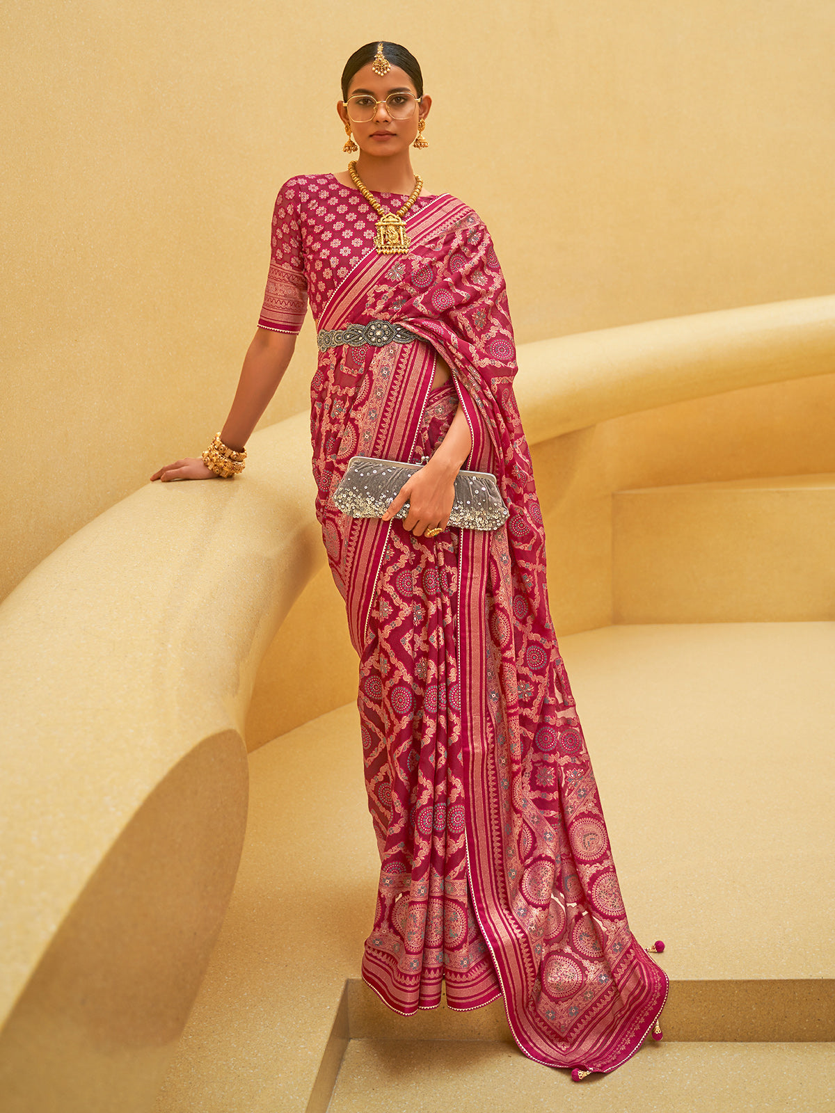 Maroon soft organza saree with zari worked border