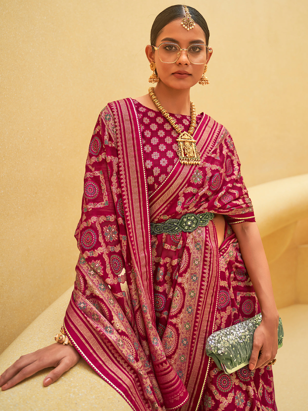 Maroon soft organza saree with zari worked border