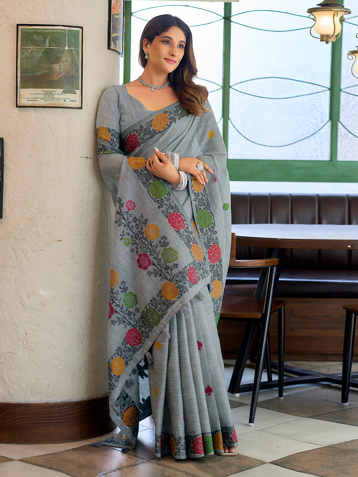 Elegant grey cotton linen saree with floral woven border