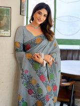 Elegant grey cotton linen saree with floral woven border
