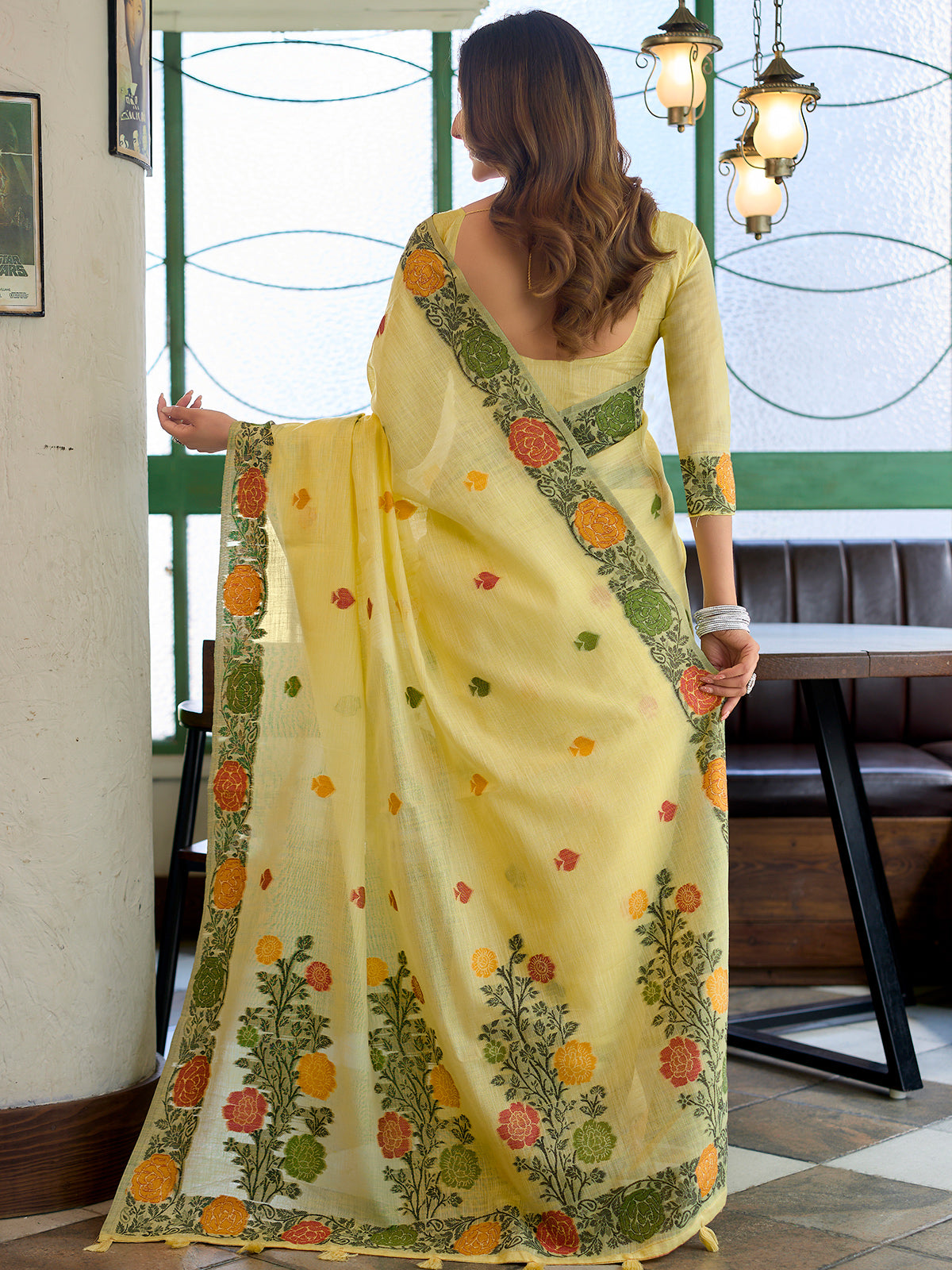 Radiant lemon yellow cotton linen saree with floral border