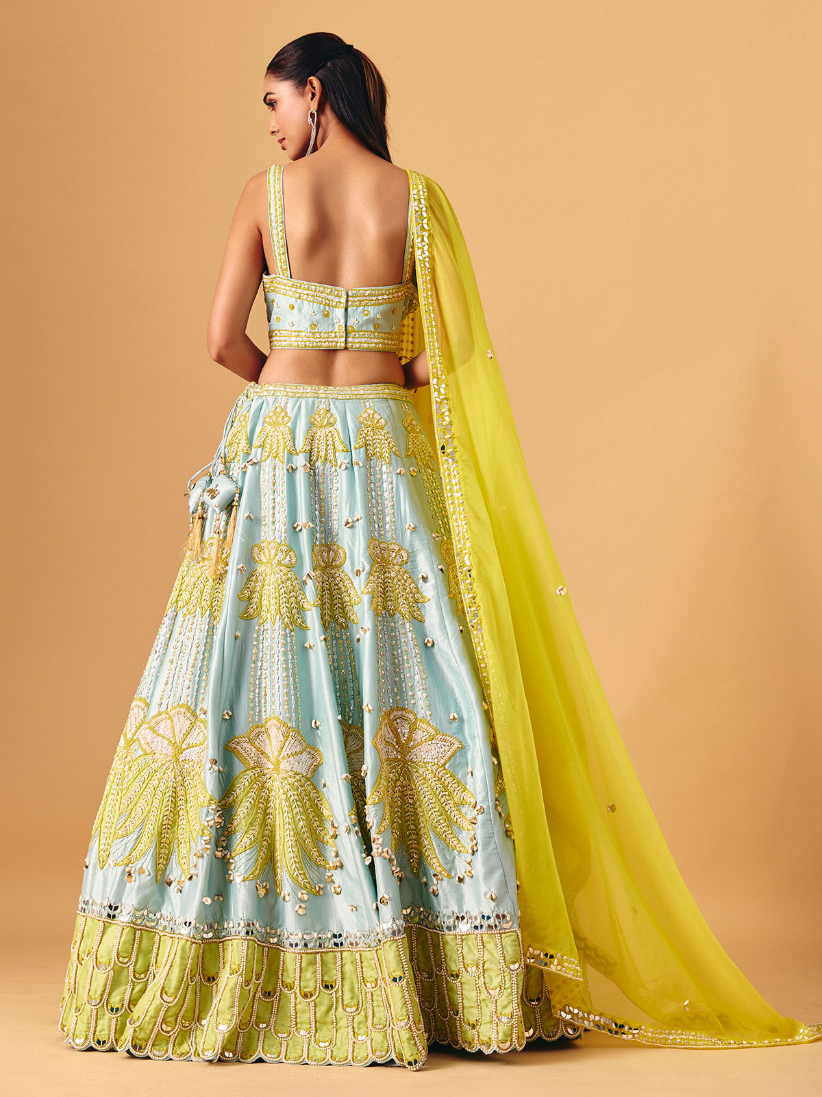 Mint blue yellow silk lehenga choli with mirror accents