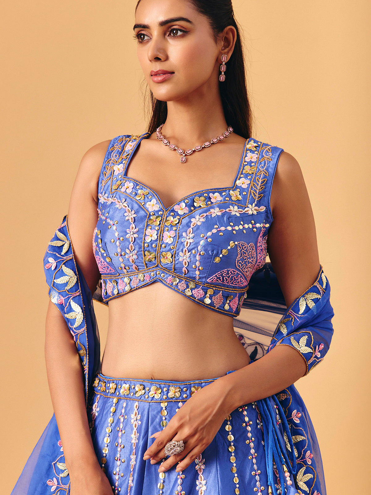 Royal blue silk lehenga choli with pearl embellished artistry