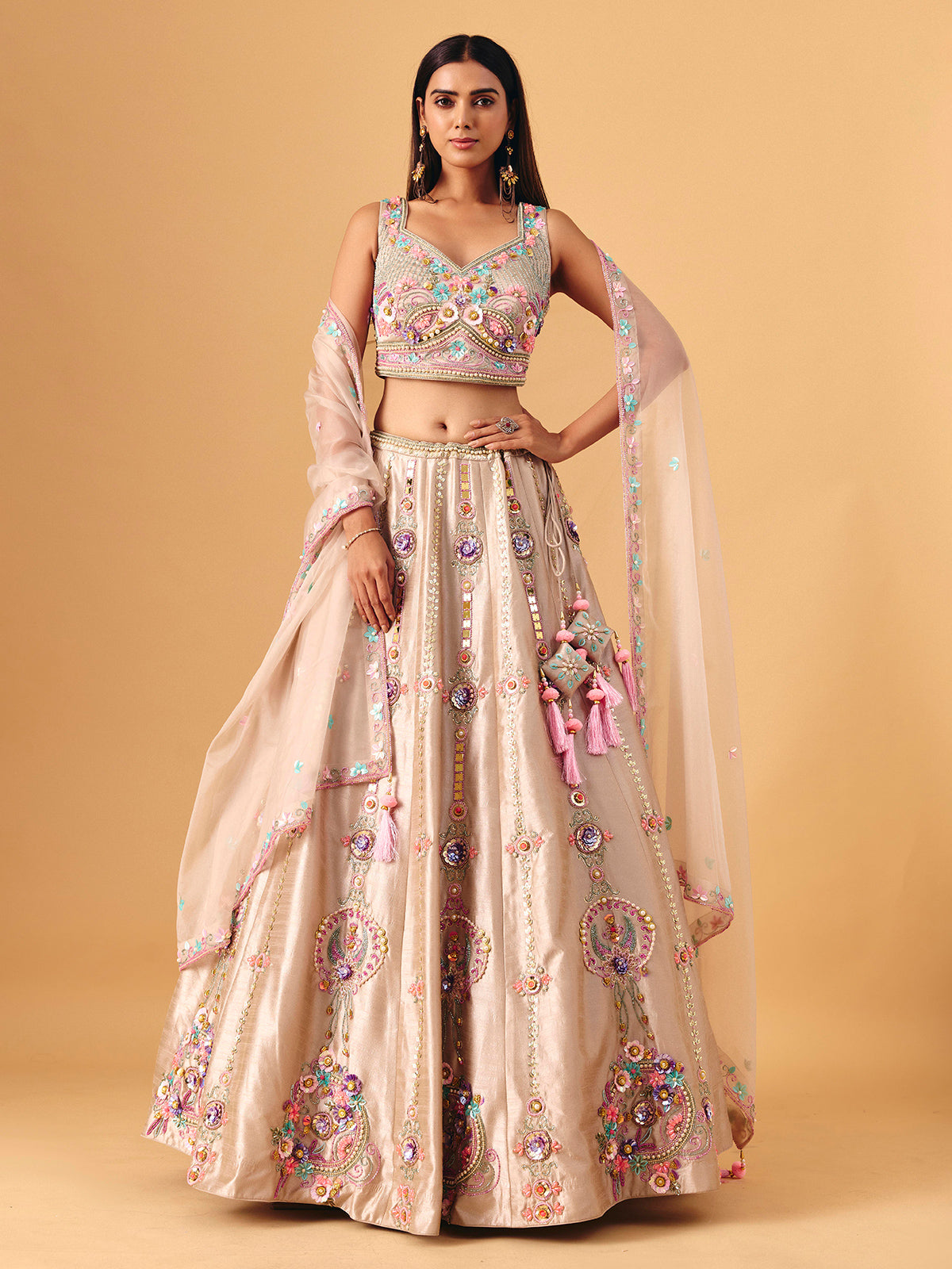 Beige silk lehenga choli with pearls and sequin elegance