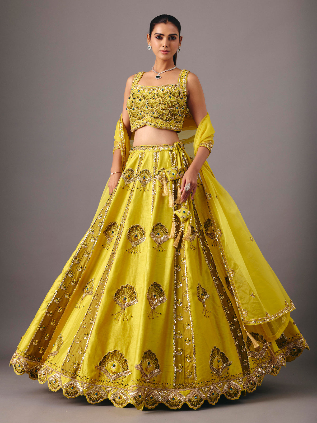 Lemon yellow raw silk lehenga choli with pearl embellishments