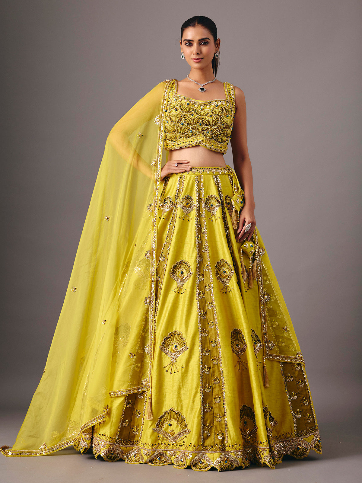 Lemon yellow raw silk lehenga choli with pearl embellishments