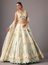 Cream silk lehenga choli with pearl and thread detailing