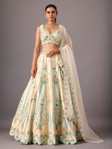 Cream silk lehenga choli with pearl and thread detailing