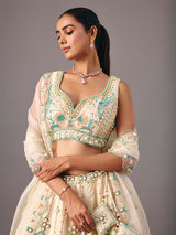 Cream silk lehenga choli with pearl and thread detailing